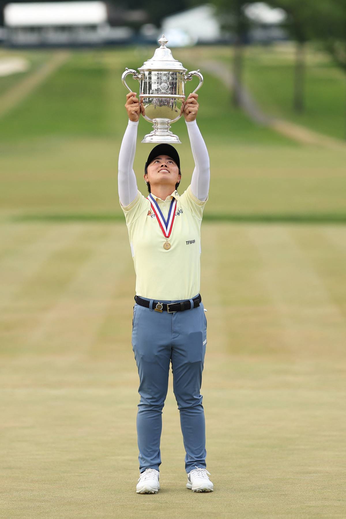 Twice as sweet YUKA Saso hoists her second U.S. Women’s Open trophy.